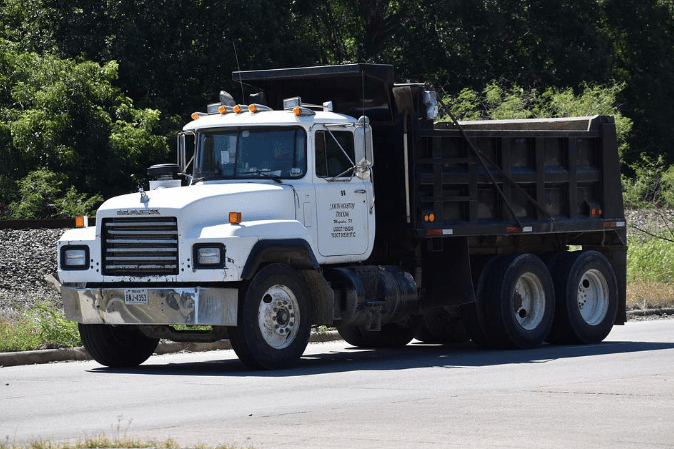 A dumper truck on the road