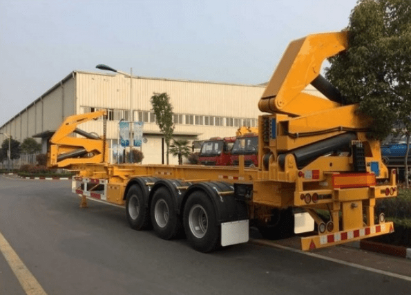 A container side loader parked on the road